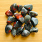 Full profile of Grade AA Bloodstone tumbled stone ready to ship from Beyond Bohemian