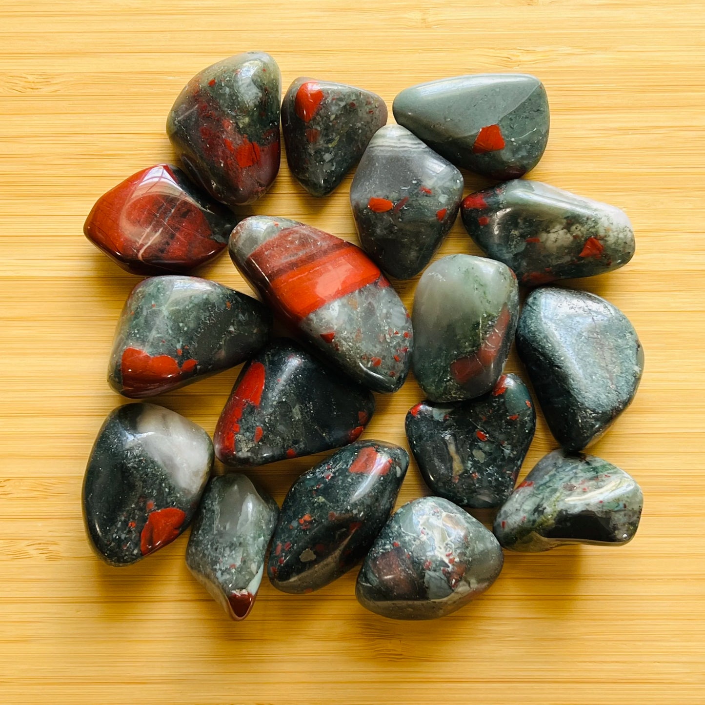 Full profile of Grade AA Bloodstone tumbled stone ready to ship from Beyond Bohemian