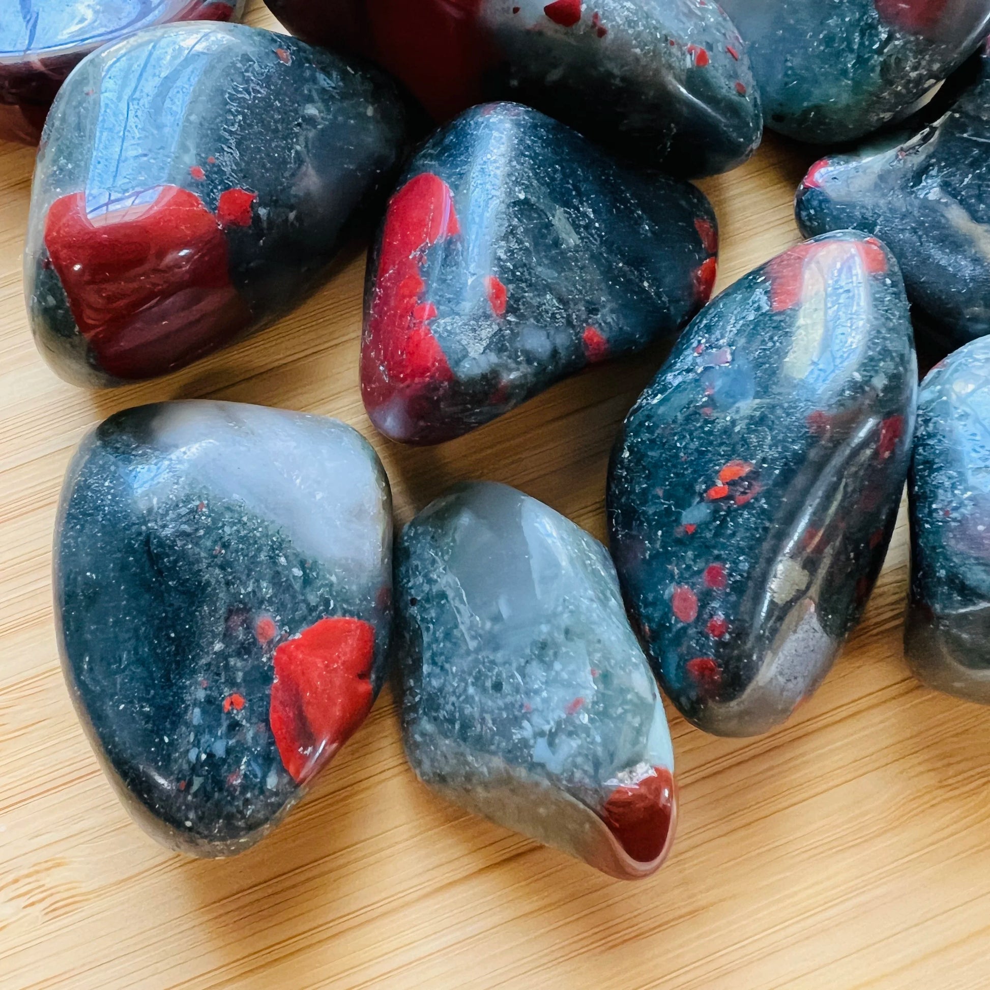 Full profile of Grade AA Bloodstone tumbled stone ready to ship from Beyond Bohemian