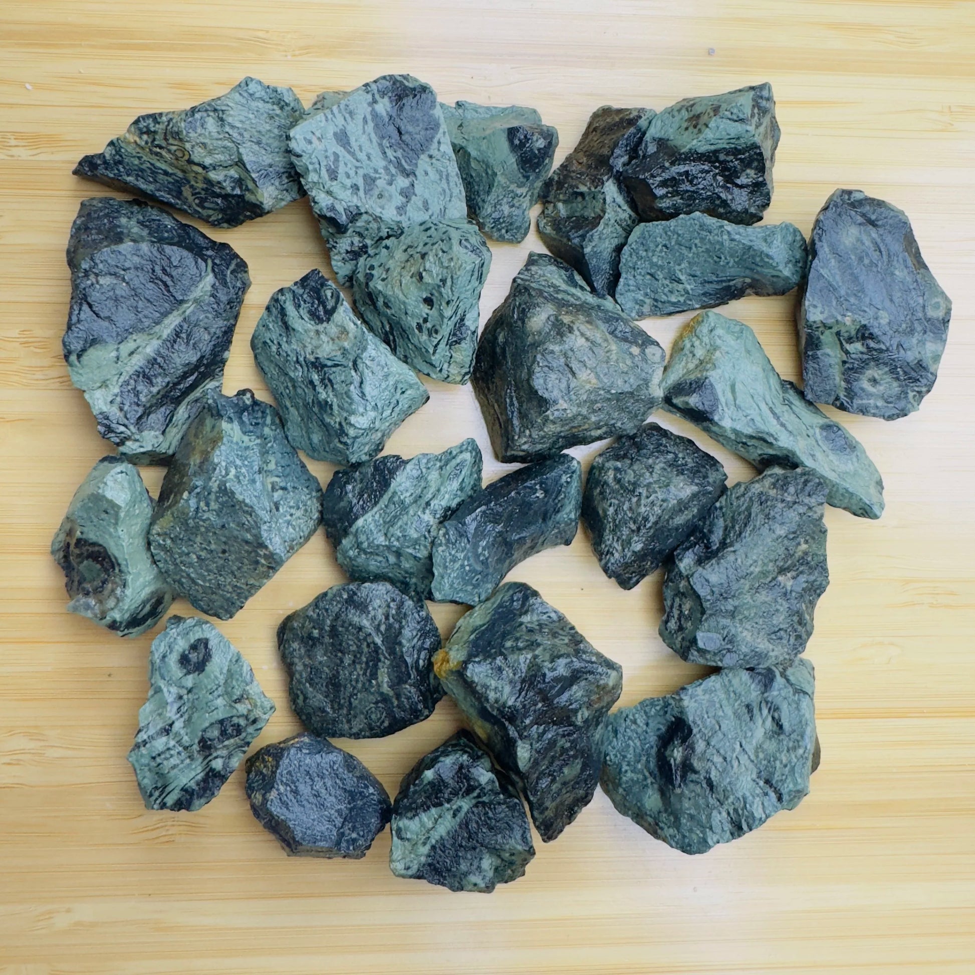 Kambaba Jasper raw stone in Green, Black tones, ethically sourced from Madagascar for Emotional Healing and Stress Relief