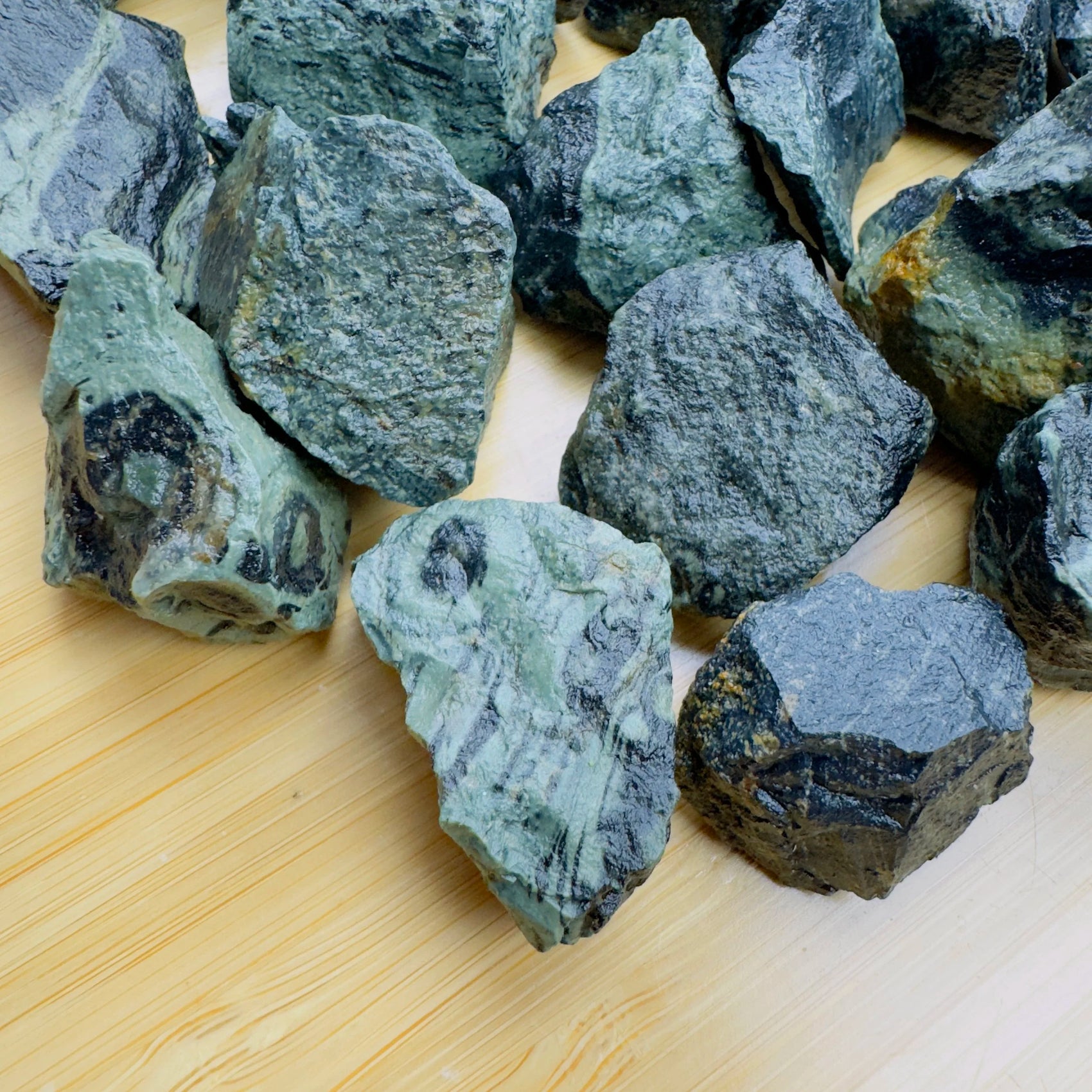Overhead angle of Grade A Kambaba Jasper raw stone, showing natural banding.