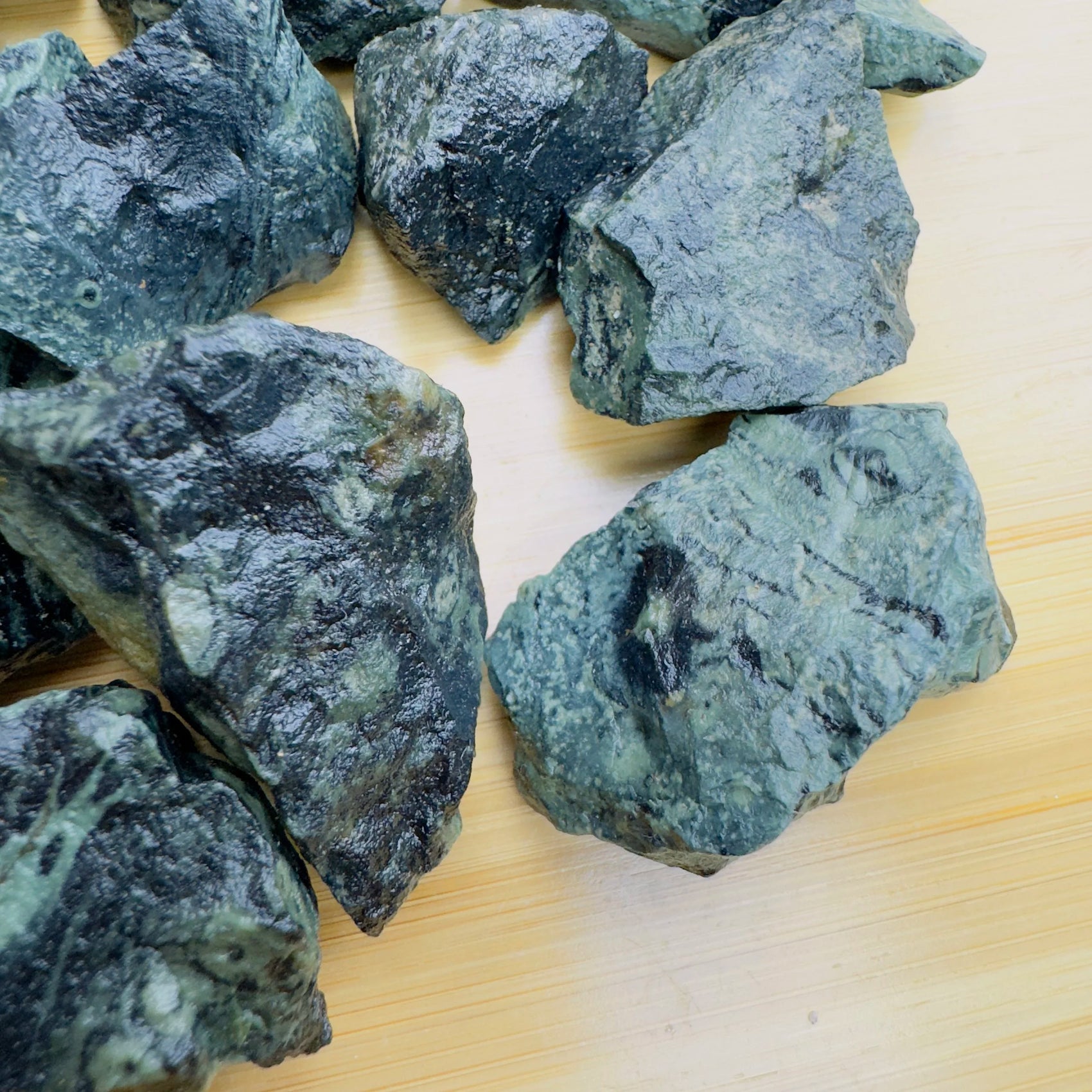 Daylight view of a single Kambaba Jasper raw stone sourced from Madagascar.