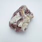 Magnified detail of Grade AA Lepidolite specimen, showing earthy tone, for Stress Relief.
