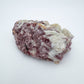 Lateral view of Lepidolite specimen, worked with for Stress Relief and Emotional Healing, showing open form.