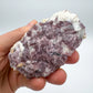 Detail shot of Grade AA Lepidolite cluster under natural light