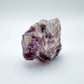 Close detail of Grade AA Lepidolite specimen, showing characteristic patterning, sourced from Minas Gerais, Brazil.
