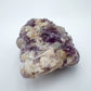 Bottom side of Lepidolite specimen, sourced from Minas Gerais, Brazil, showing characteristic color.