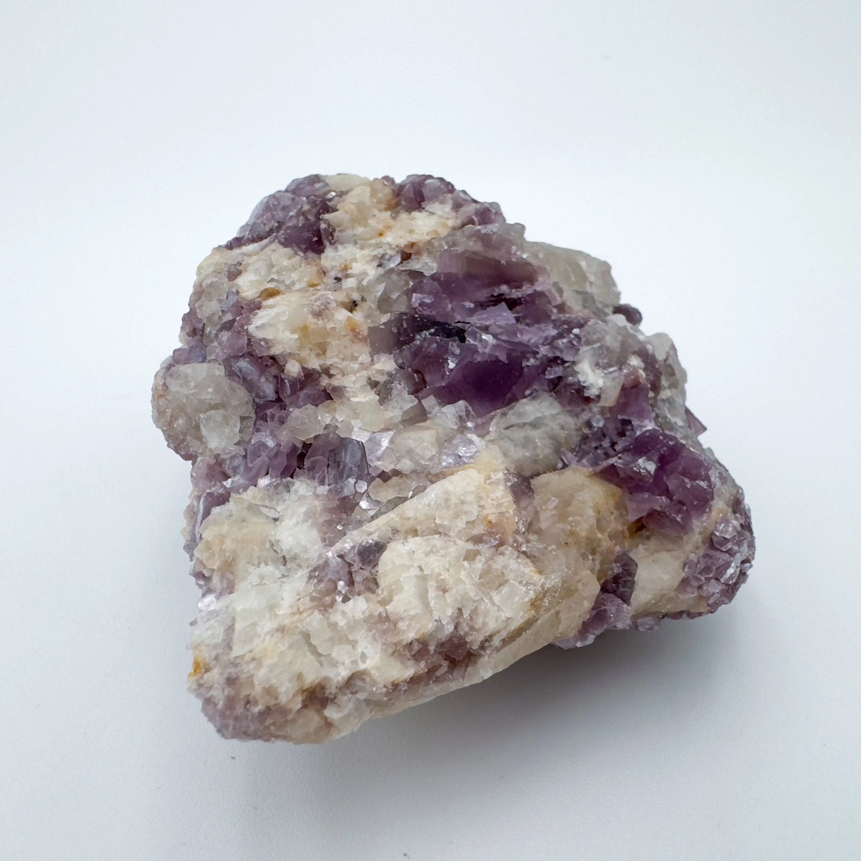 Bottom side of Lepidolite specimen, sourced from Minas Gerais, Brazil, showing characteristic color.