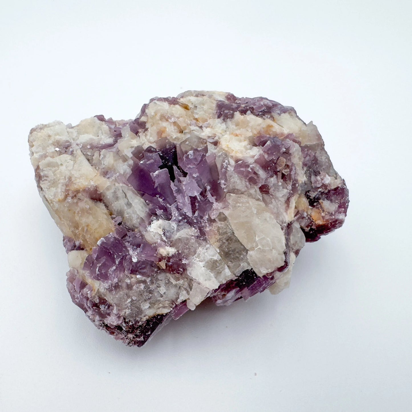 Hand-held view of a Lepidolite specimen carried for Stress Relief, hand-selected from Minas Gerais, Brazil.
