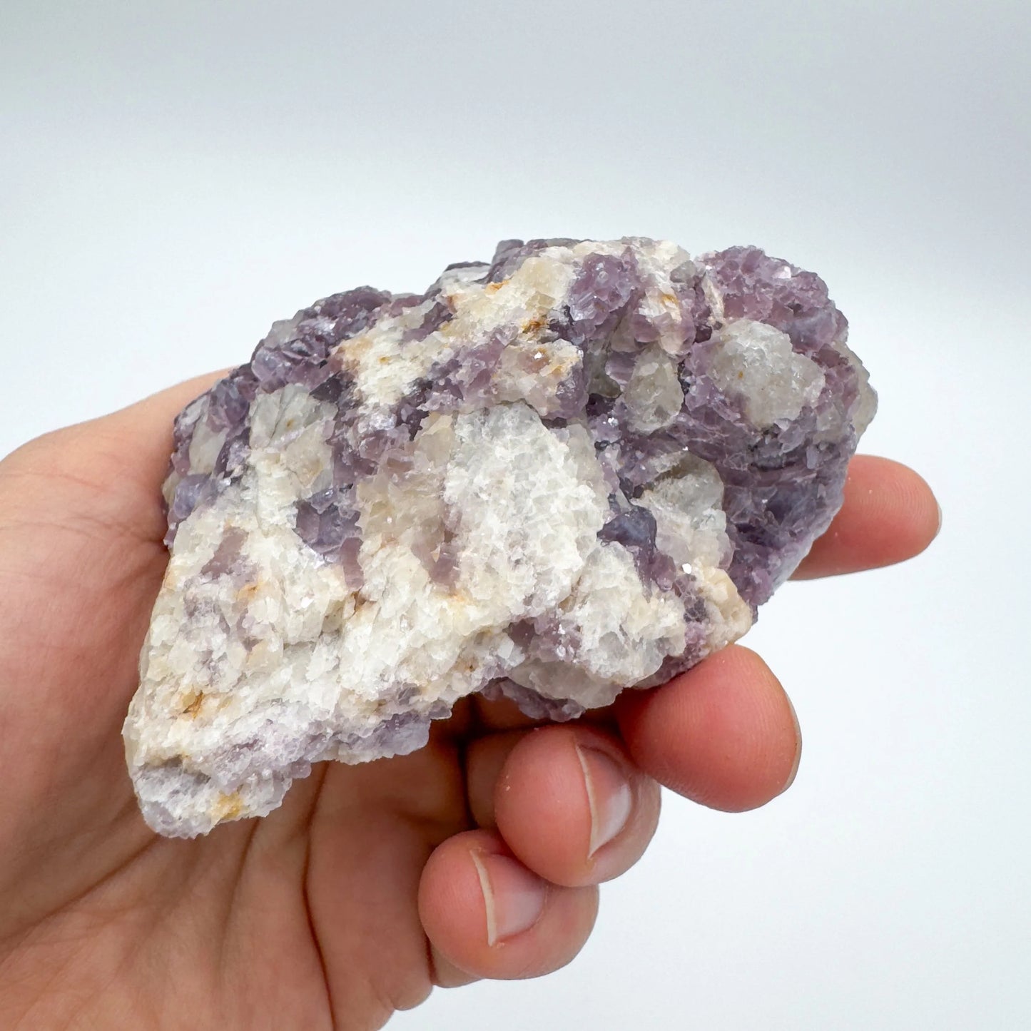 Detail shot of Grade AA Lepidolite cluster under natural light