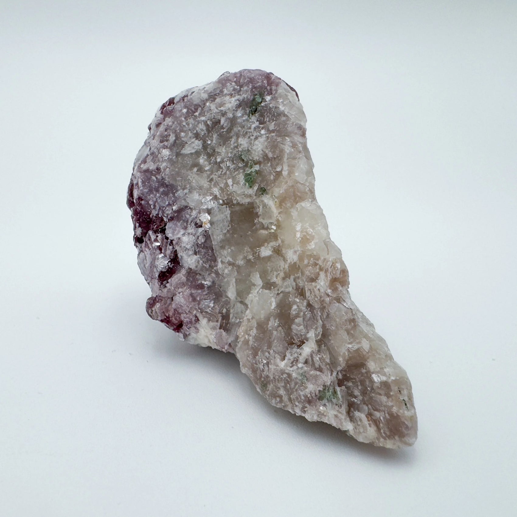 Color detail of Lepidolite specimen, showing natural variation, sourced from Minas Gerais, Brazil.