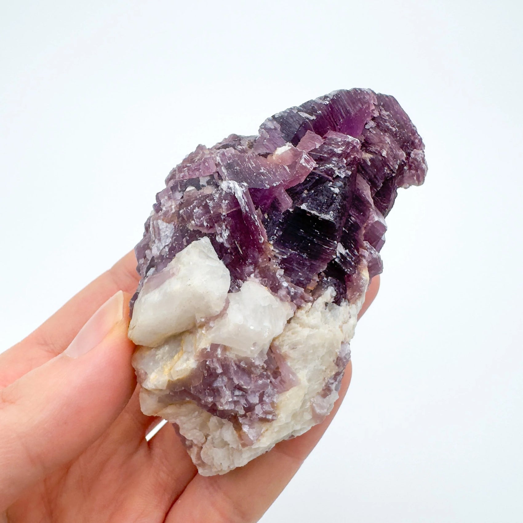 Detail shot of Grade AA Lepidolite cluster under natural light