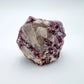 Close-up of Lepidolite raw crystal from Brazil, soothing wellness stone for Emotional Healing