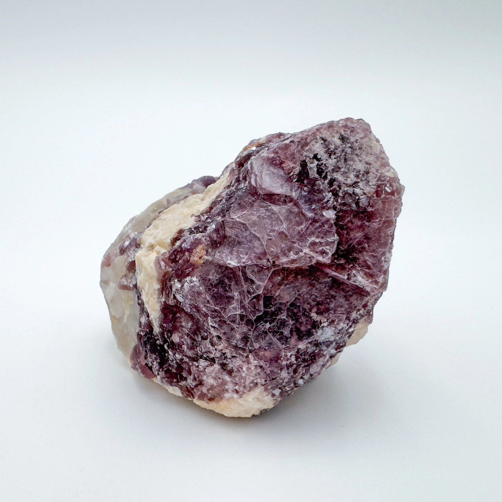 Profile view of purple Lepidolite specimen, kept close for Stress Relief, showing natural color depth.