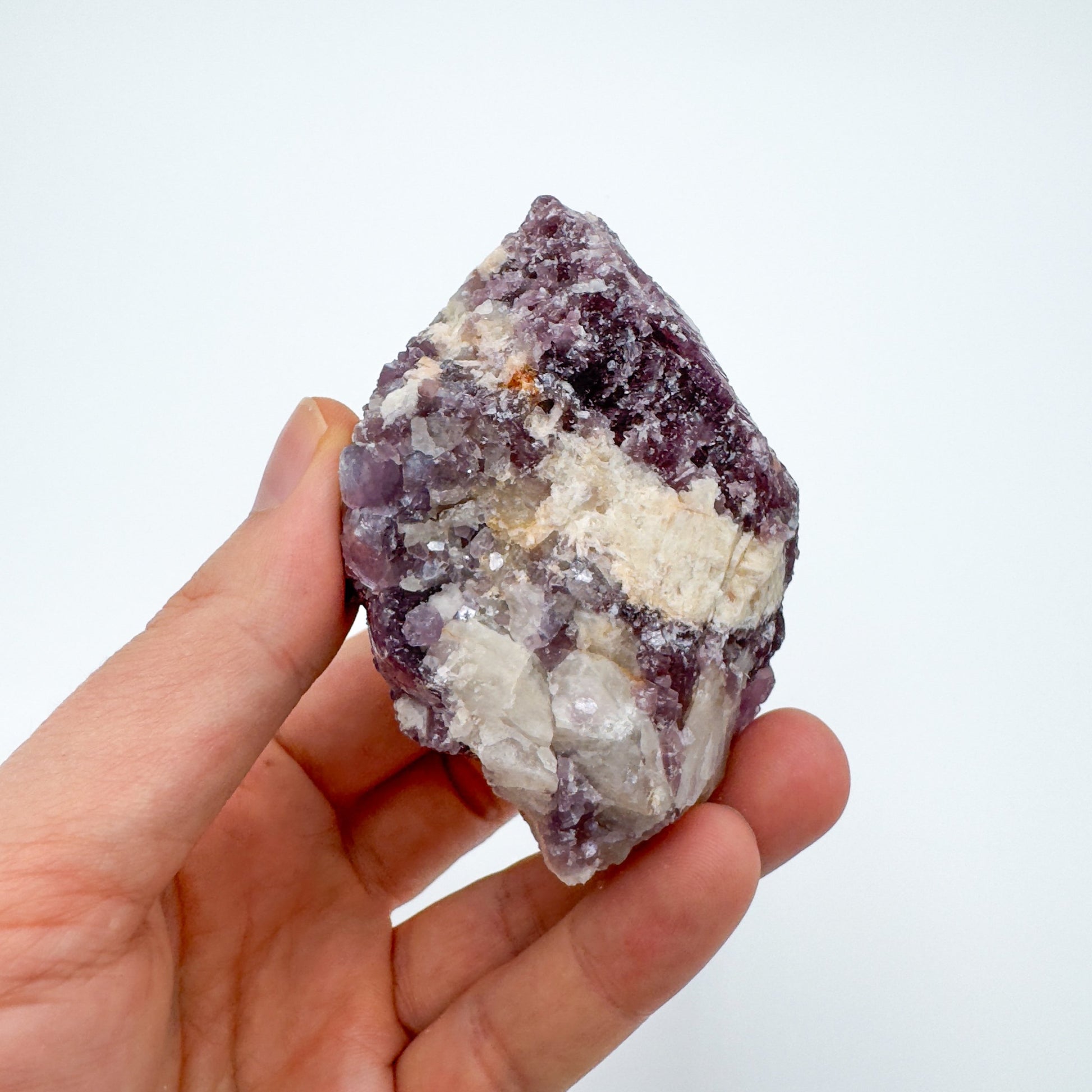 Close-up of Lepidolite raw crystal from Brazil, soothing wellness stone for Emotional Healing