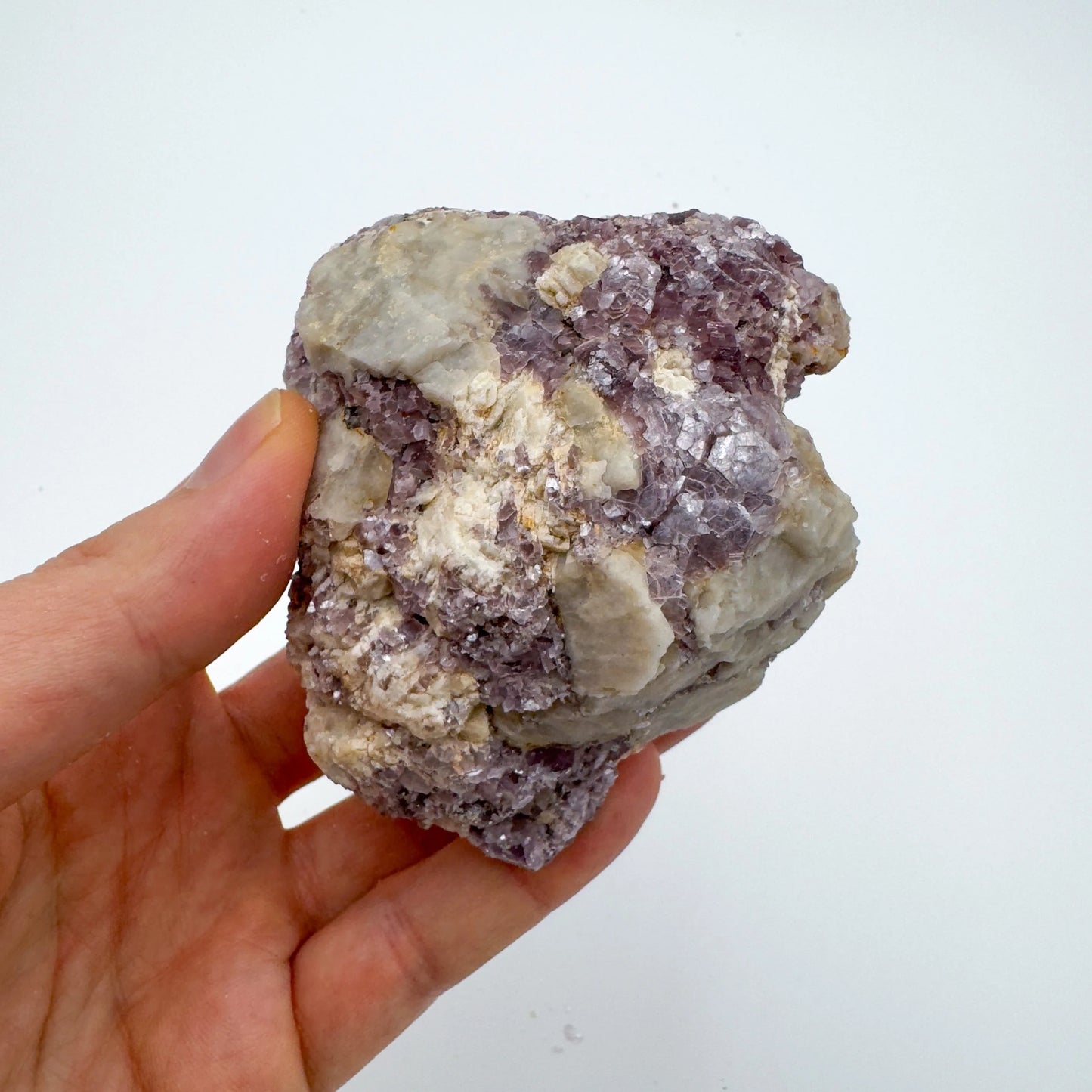 Detail shot of Grade AA Lepidolite cluster under natural light