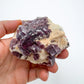 Detail shot of Grade AA Lepidolite cluster under natural light