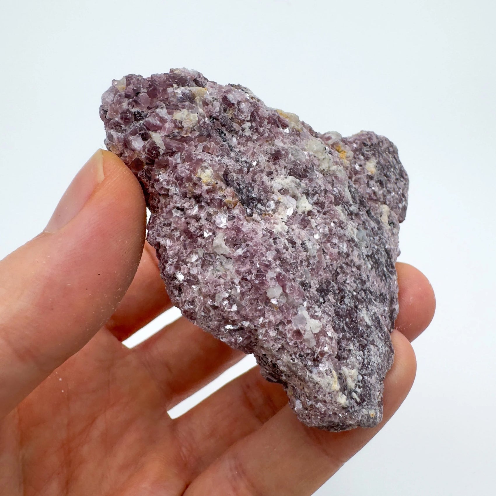Soft-light view of Lepidolite specimen, often kept for Sleep, with surface texture in view.