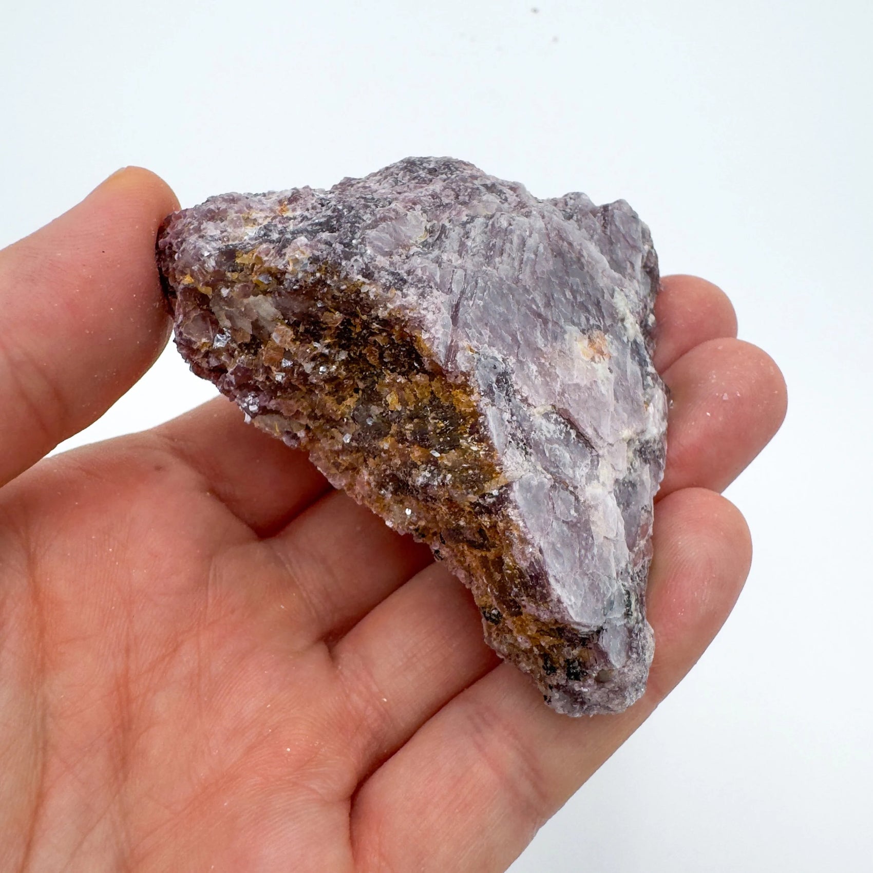 Detail shot of Grade AA Lepidolite cluster under natural light