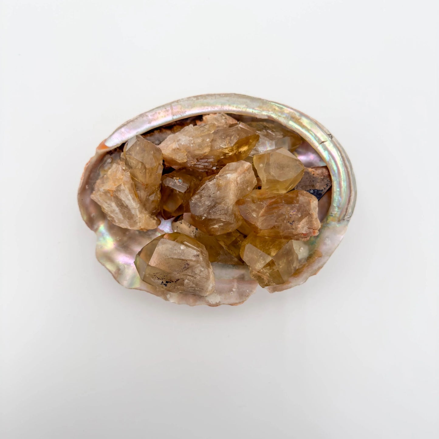 Detail of Grade A Natural Citrine raw stone, hand-selected from Haut-Lomami, Democratic Republic of the Congo, showing open form.