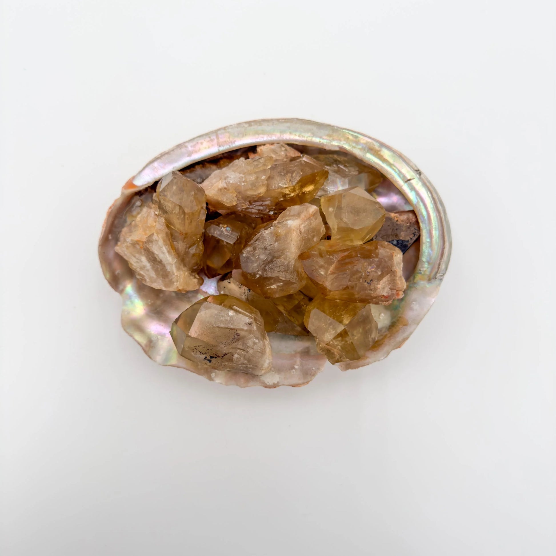 Detail of Grade A Natural Citrine raw stone, hand-selected from Haut-Lomami, Democratic Republic of the Congo, showing open form.