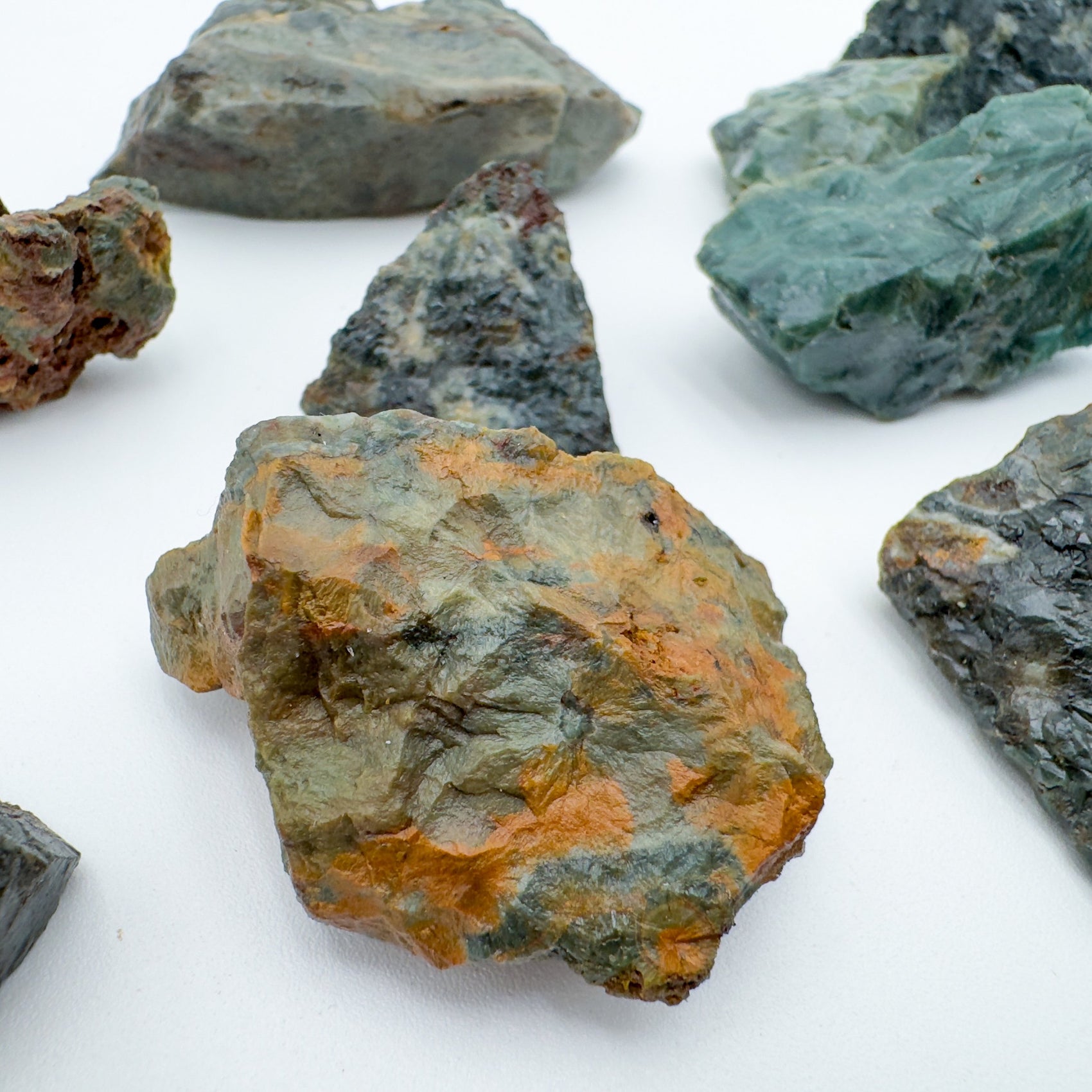 Overhead view of Grade AA Ocean Jasper raw stone, showing raw matrix, hand-selected from Sofia, Madagascar.