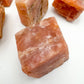 Full profile of Grade AA Orange Calcite raw ready to ship from Beyond Bohemian