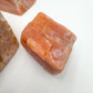 Full profile of Grade AA Orange Calcite raw ready to ship from Beyond Bohemian