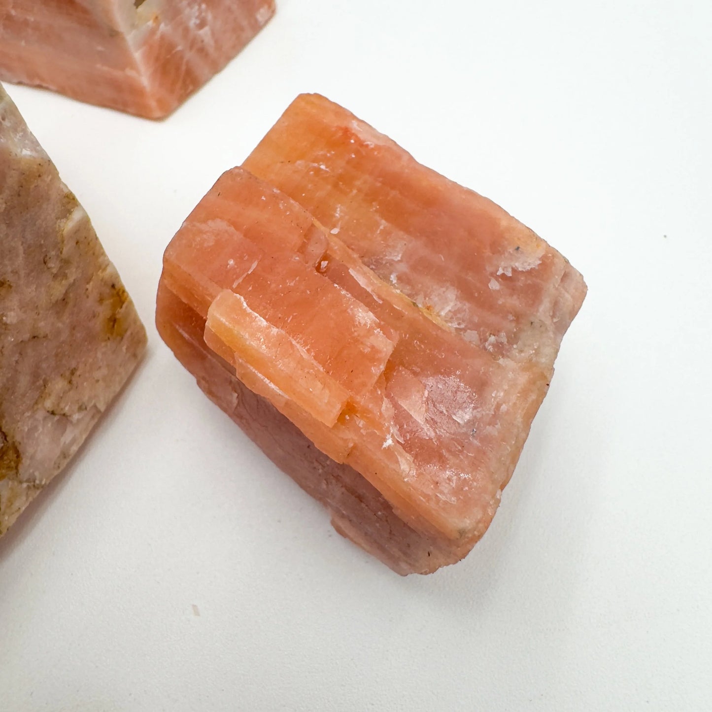 Full profile of Grade AA Orange Calcite raw ready to ship from Beyond Bohemian
