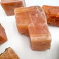 Full profile of Grade AA Orange Calcite raw ready to ship from Beyond Bohemian