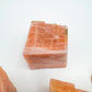 Full profile of Grade AA Orange Calcite raw ready to ship from Beyond Bohemian