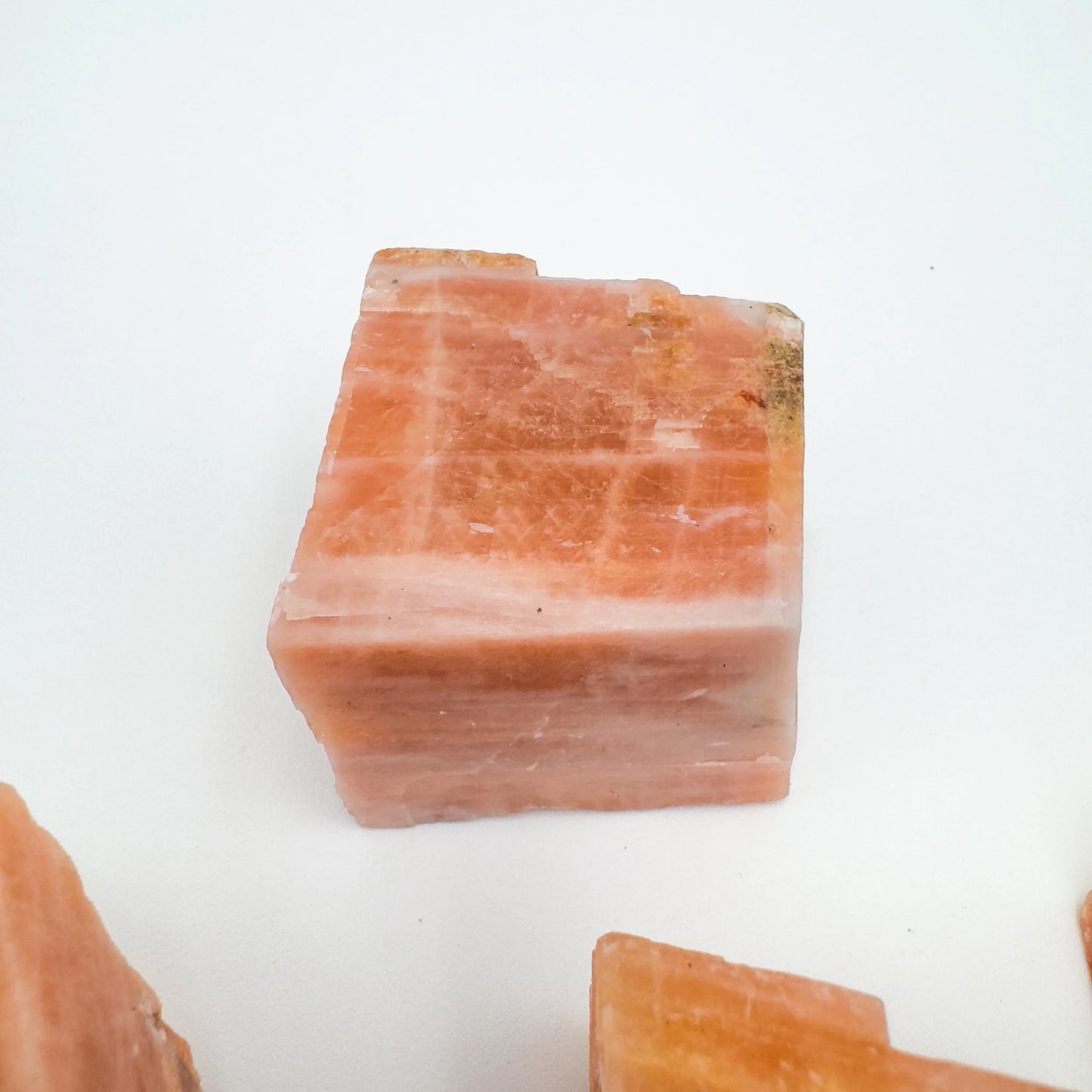 Full profile of Grade AA Orange Calcite raw ready to ship from Beyond Bohemian