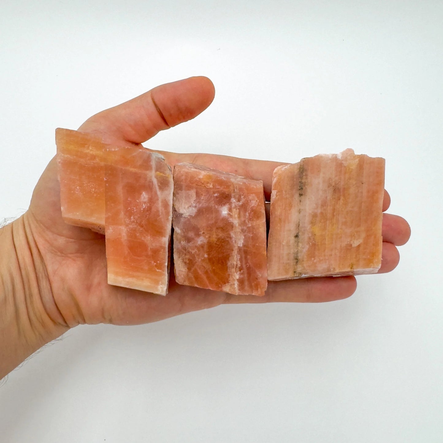 Full profile of Grade AA Orange Calcite raw ready to ship from Beyond Bohemian