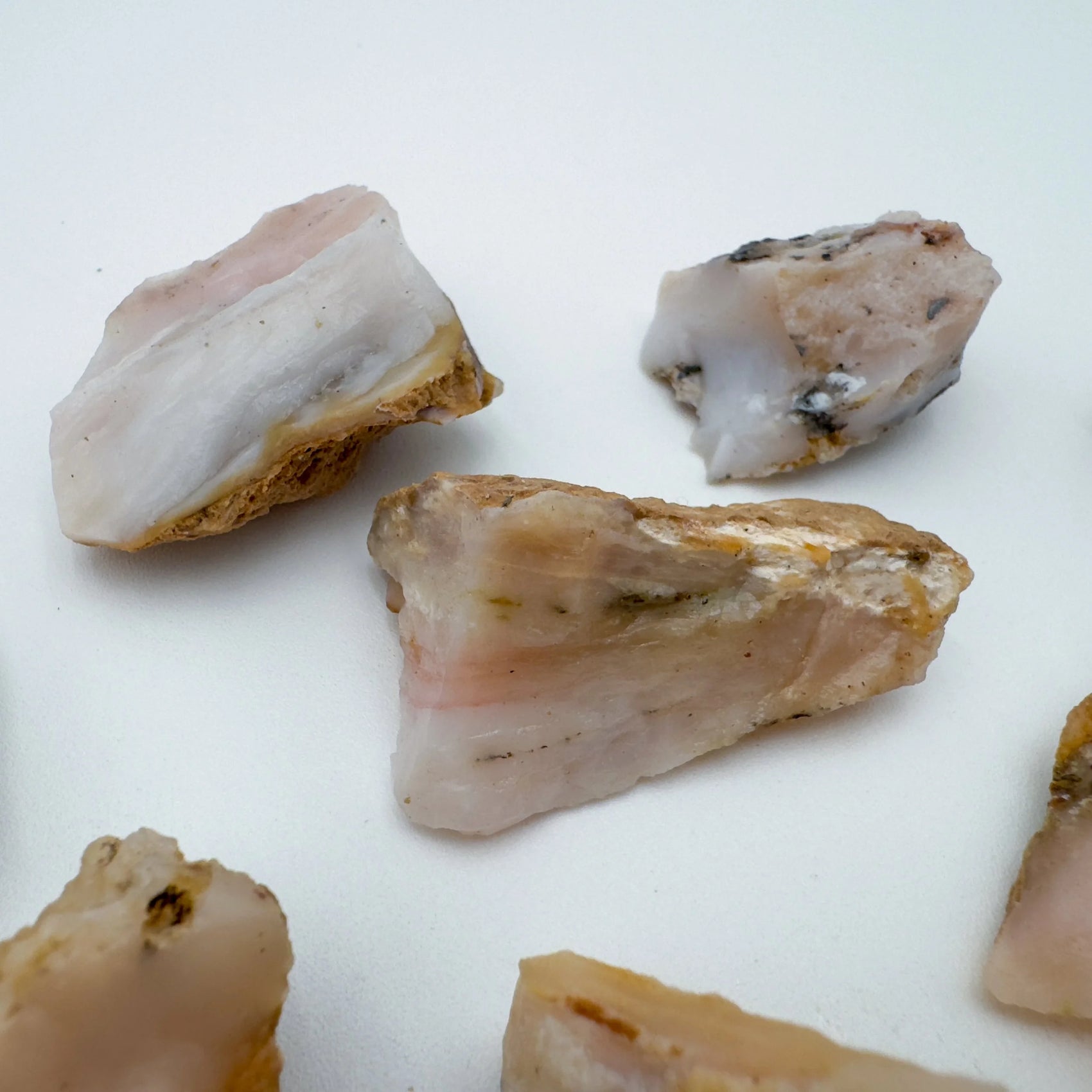 Close-up of Pink Opal raw stone from Peru, soothing wellness stone for Emotional Healing