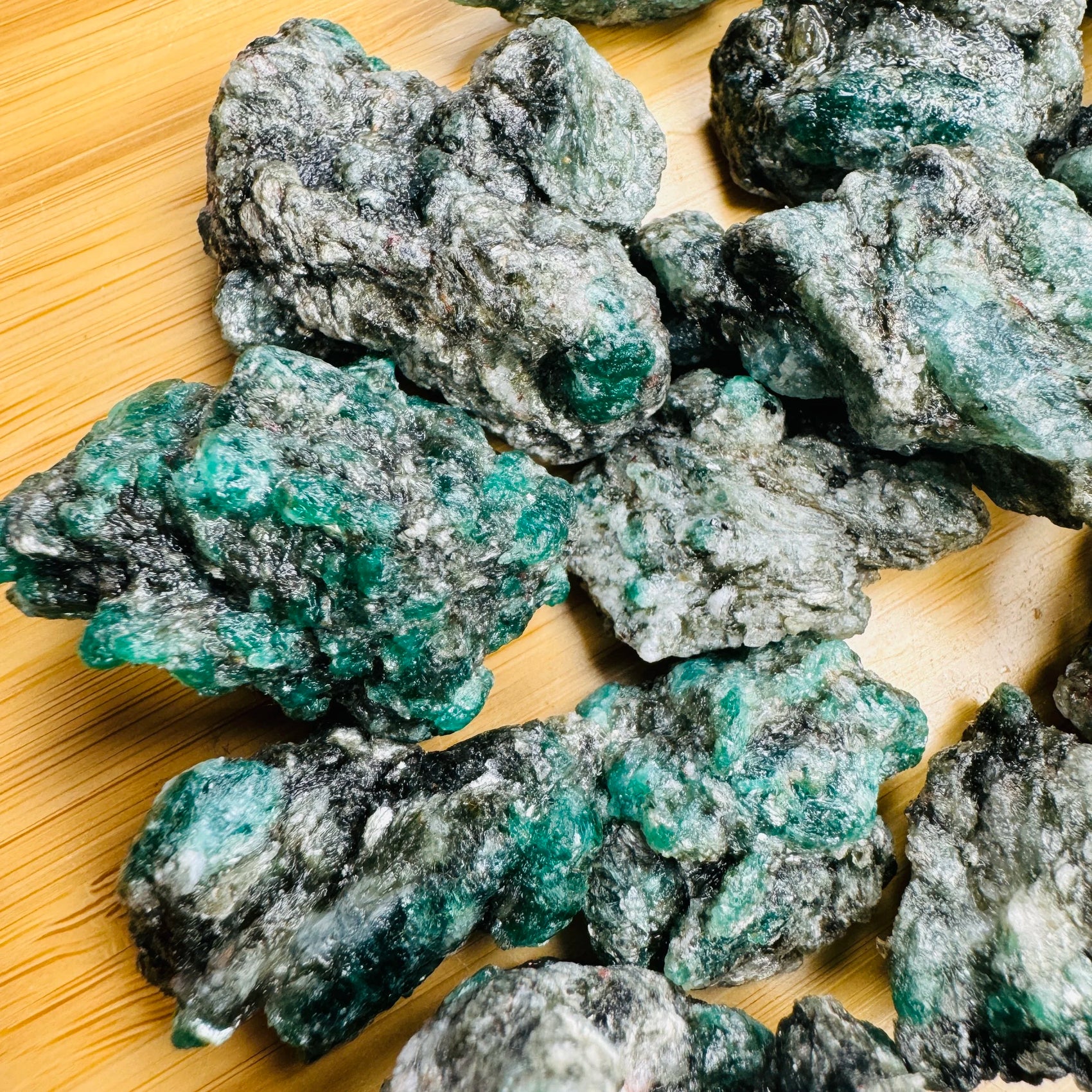 Close-up of Emerald raw stone from Zimbabwe, soothing wellness stone for Healing