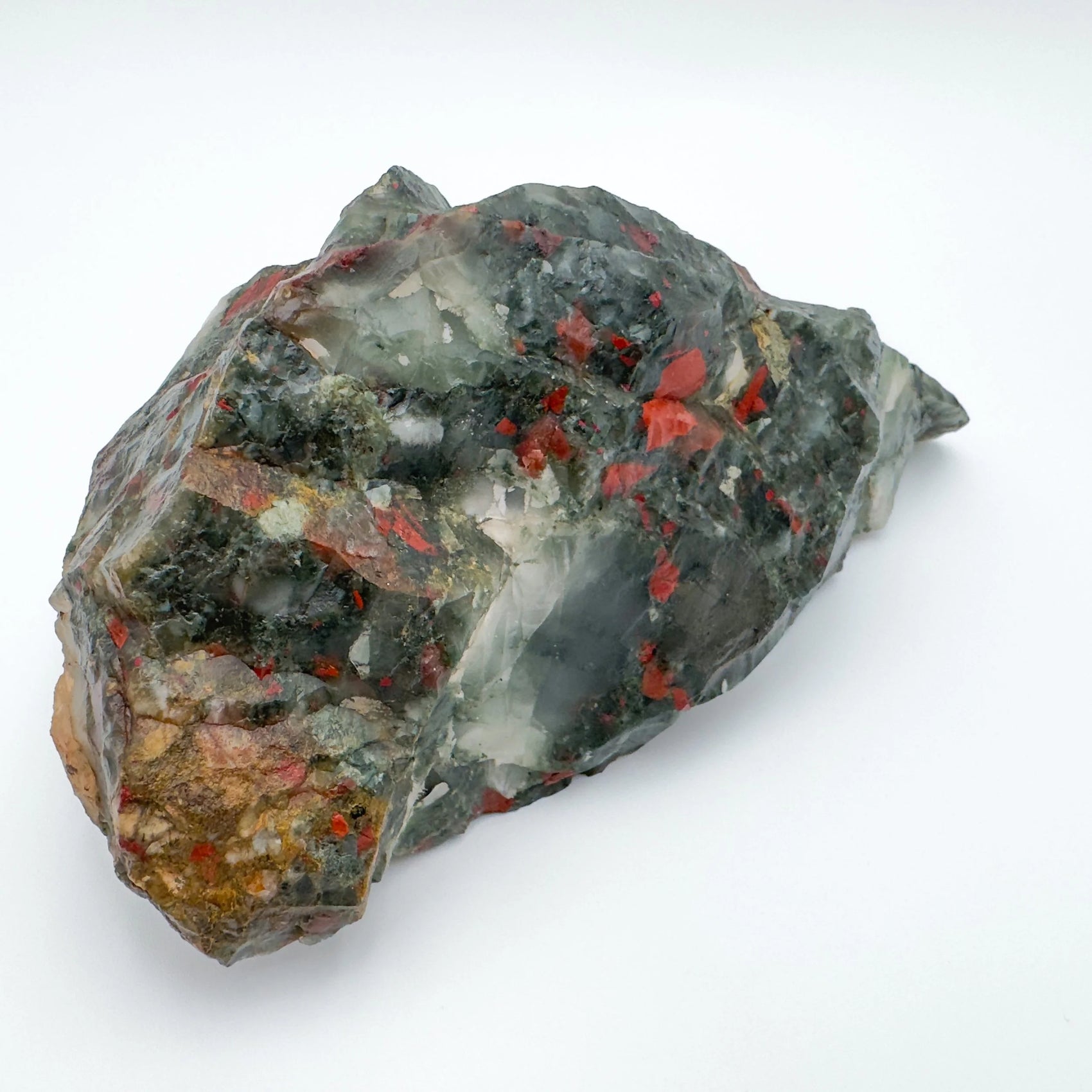 Edge view of Grade AA Bloodstone specimen, for Energy and Protection, showing natural texture.