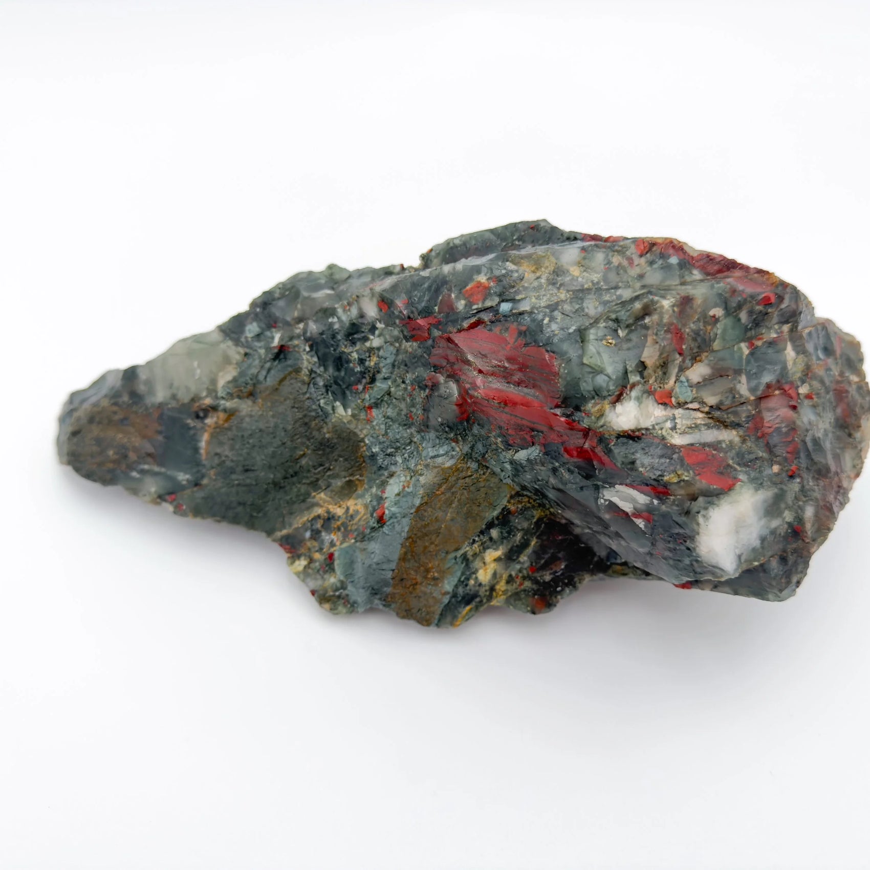 Natural light context of Bloodstone specimen, from Hhohho, Eswatini, captured in soft, even lighting.