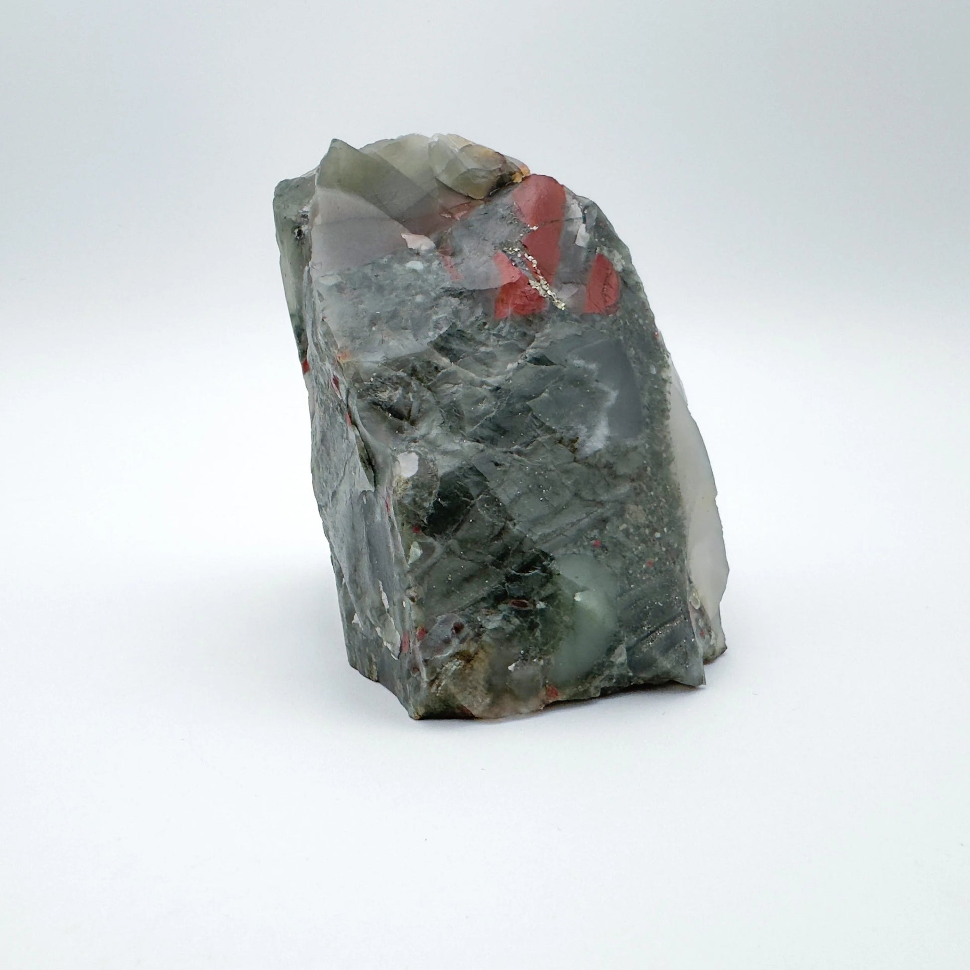 Field-of-view of Bloodstone specimen, often kept for Confidence, with weight visible in the palm.