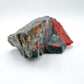 Palm-scale view of one Bloodstone specimen for scale, from Hhohho, Eswatini.