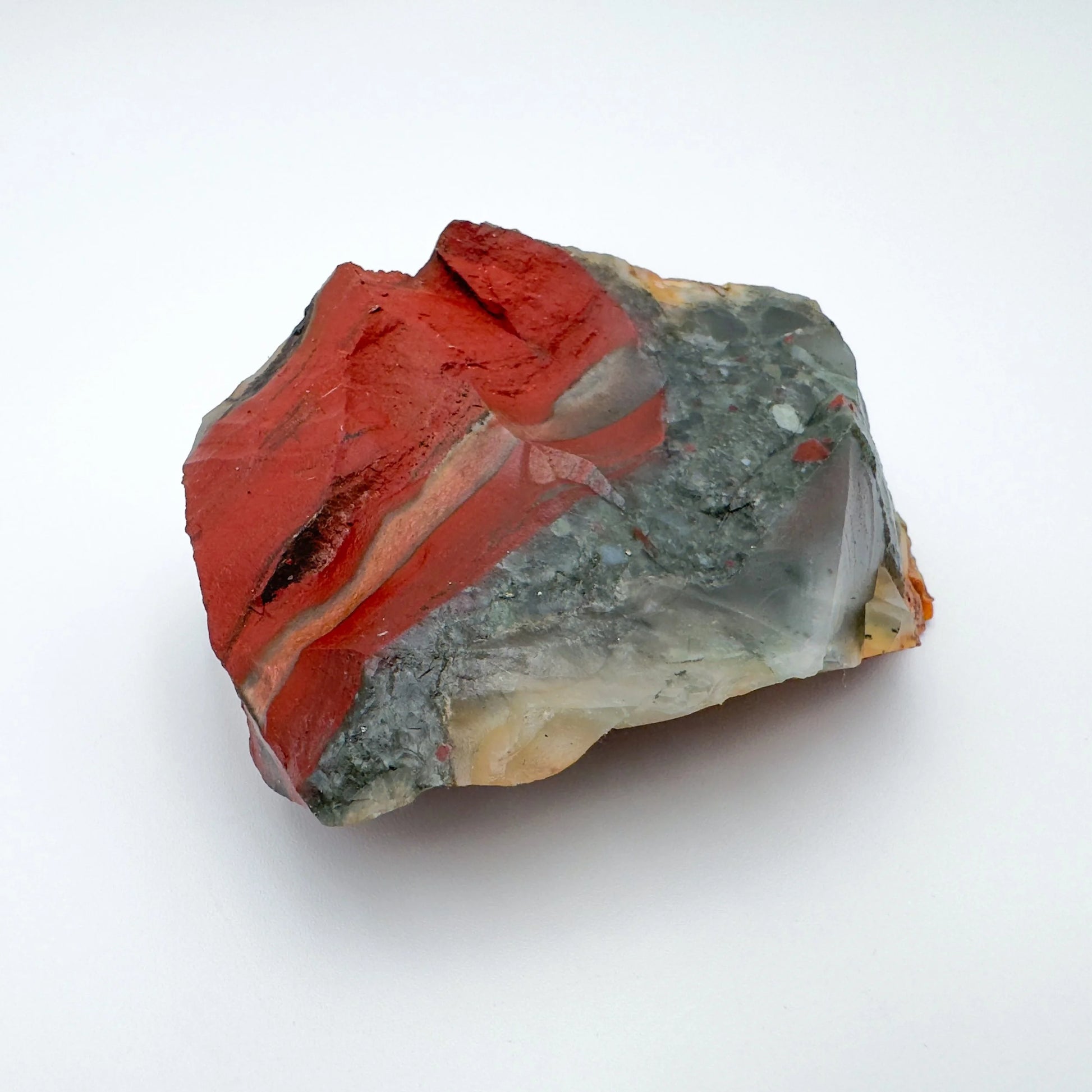 Held in hand, one Bloodstone specimen for scale, sourced from Eswatini.