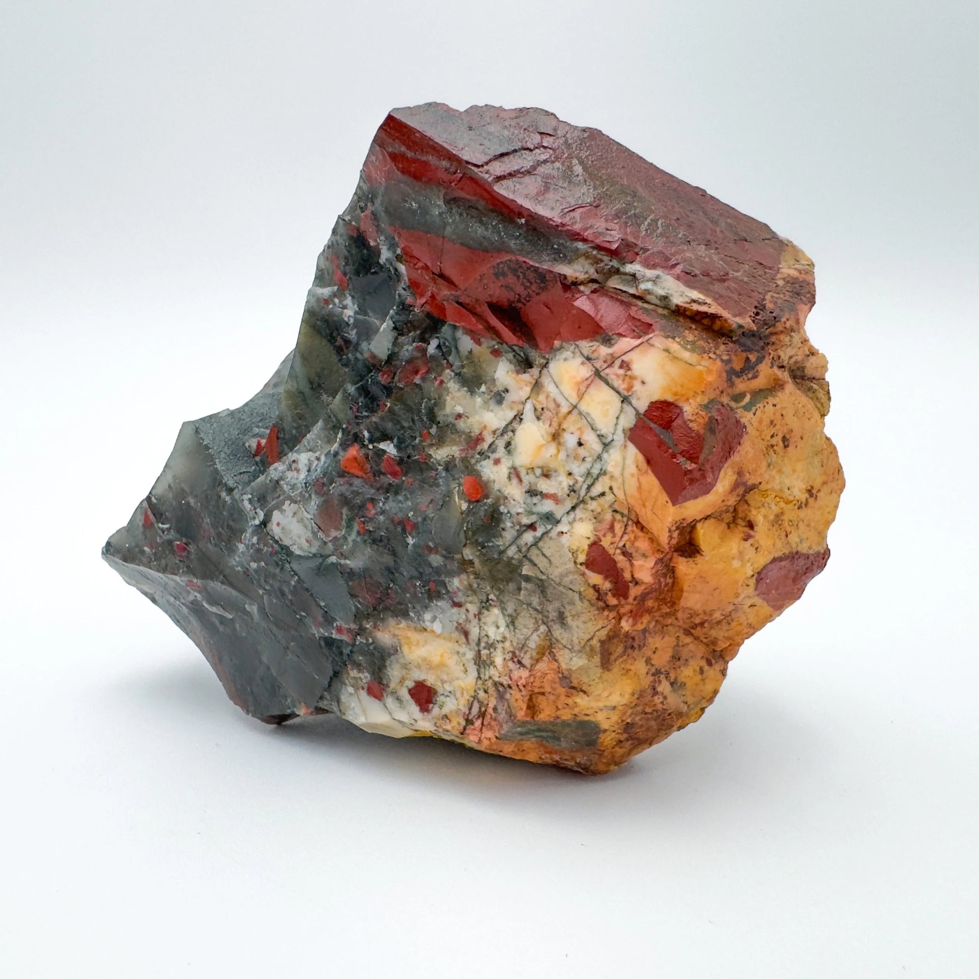 Sideways view of Bloodstone specimen, showing natural inclusions.
