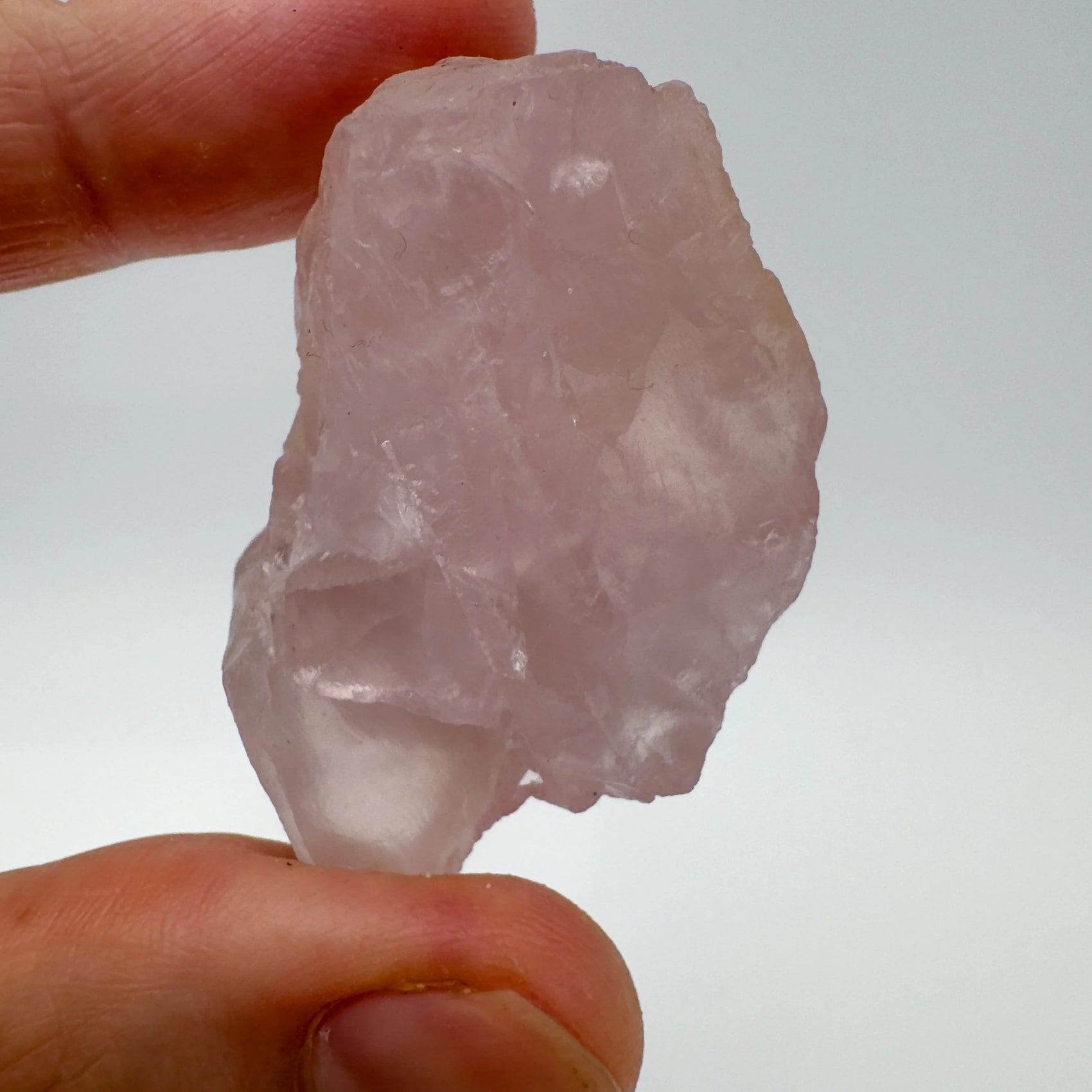Close-up of Rose Quartz raw crystal from Madagascar, soothing wellness stone for Emotional Healing