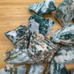 Profile view of green Tree Agate raw stone, turned to for Healing, from Central District, Botswana.