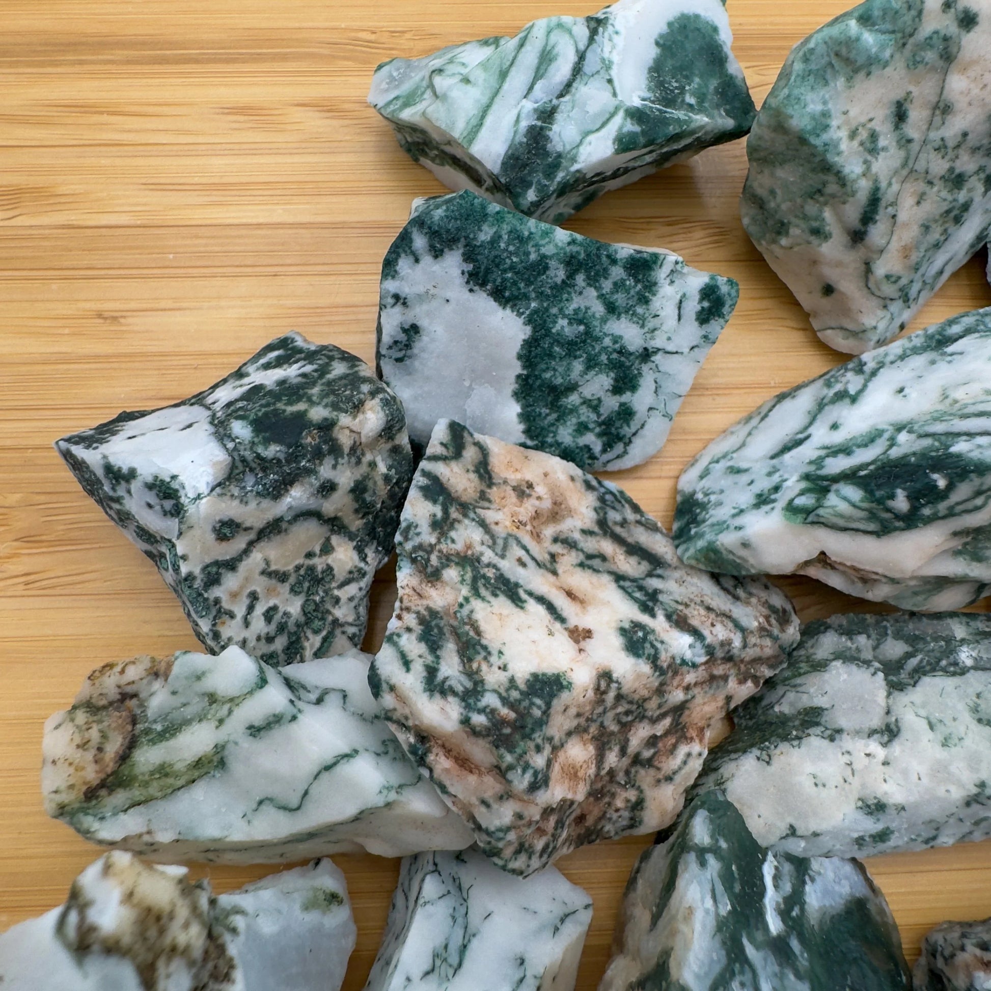 Profile view of green Tree Agate raw stone, turned to for Healing, from Central District, Botswana.