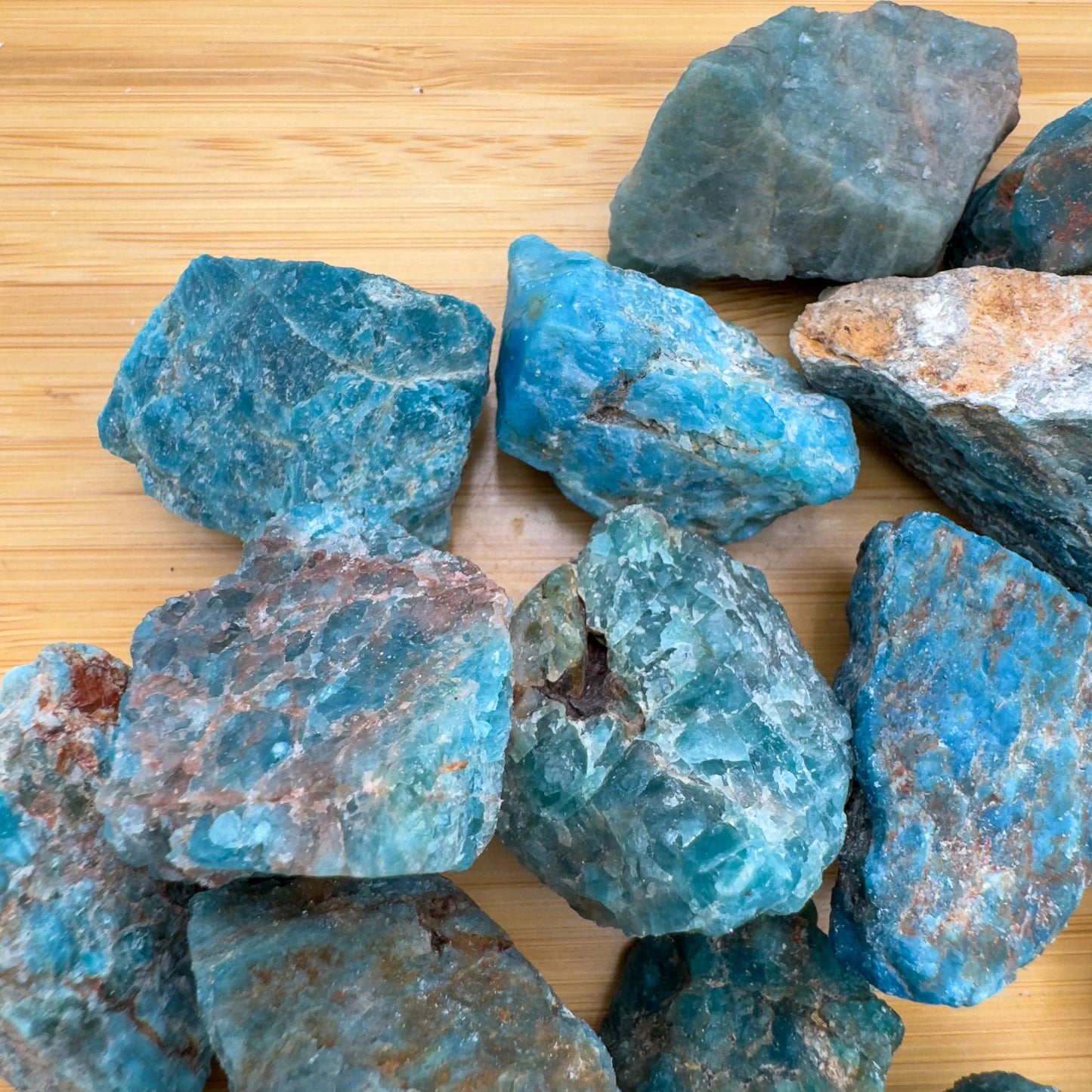 Texture-level view of Apatite raw stone, to support Focus, showing earthy tone.