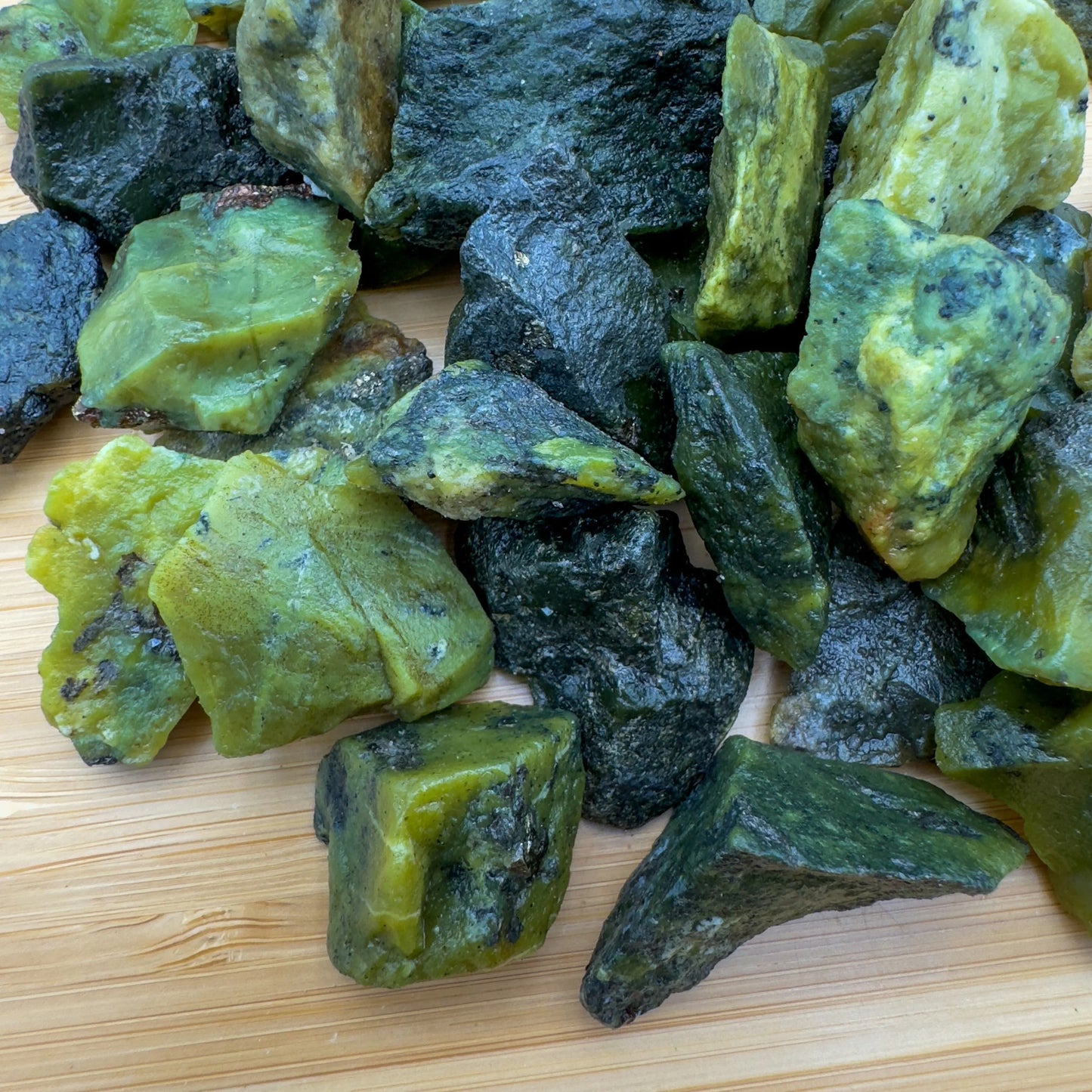 Close-up of Serpentine raw stone from Peru, soothing wellness stone for Emotional Healing