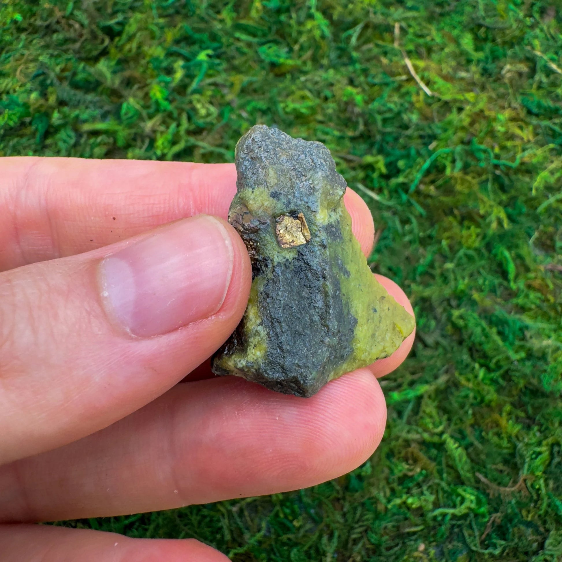 Close-up of Serpentine raw stone from Peru, soothing wellness stone for Emotional Healing