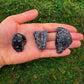 Detail shot of Grade AA Snowflake Obsidian raw under natural light