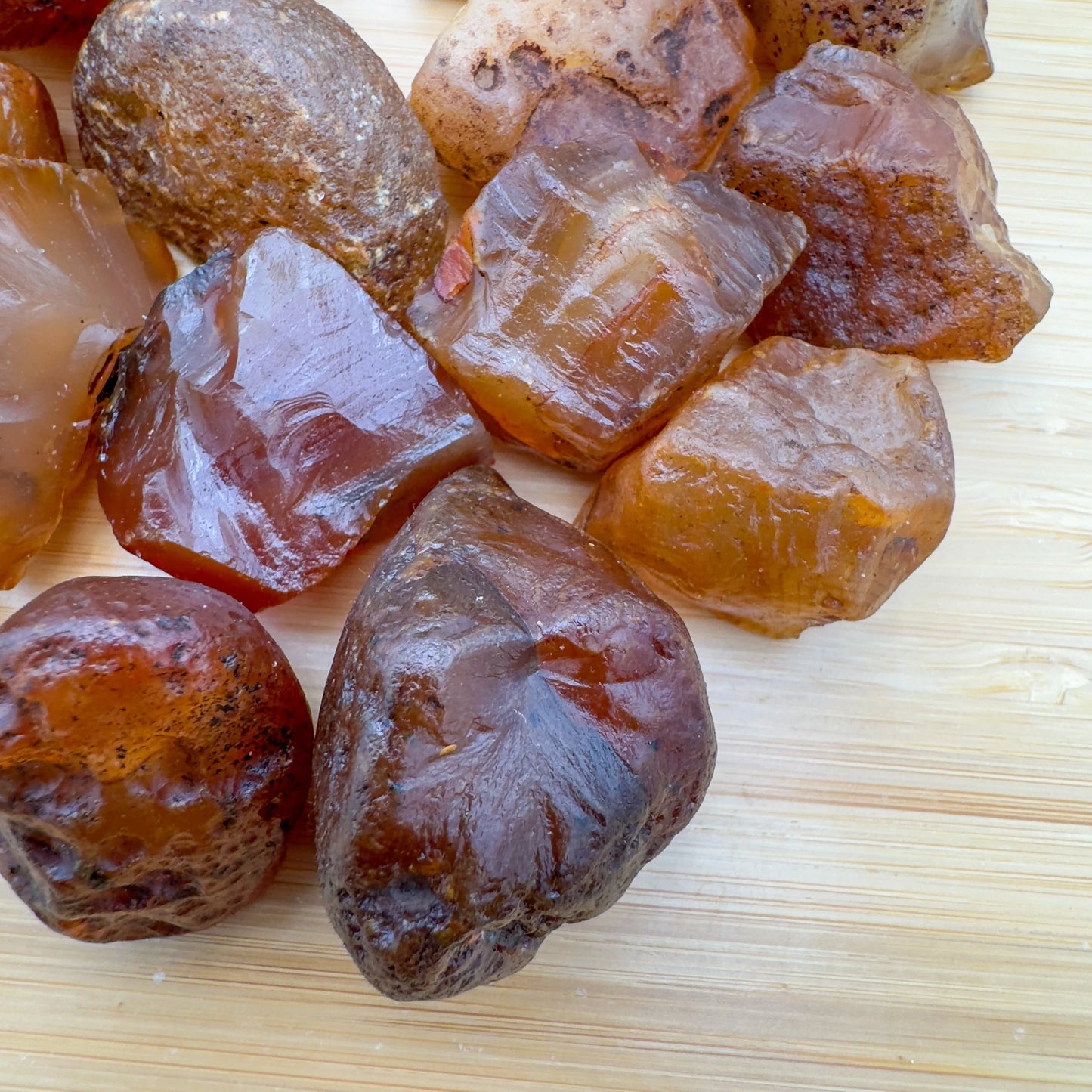 Back view of Grade A Carnelian raw showing natural surface