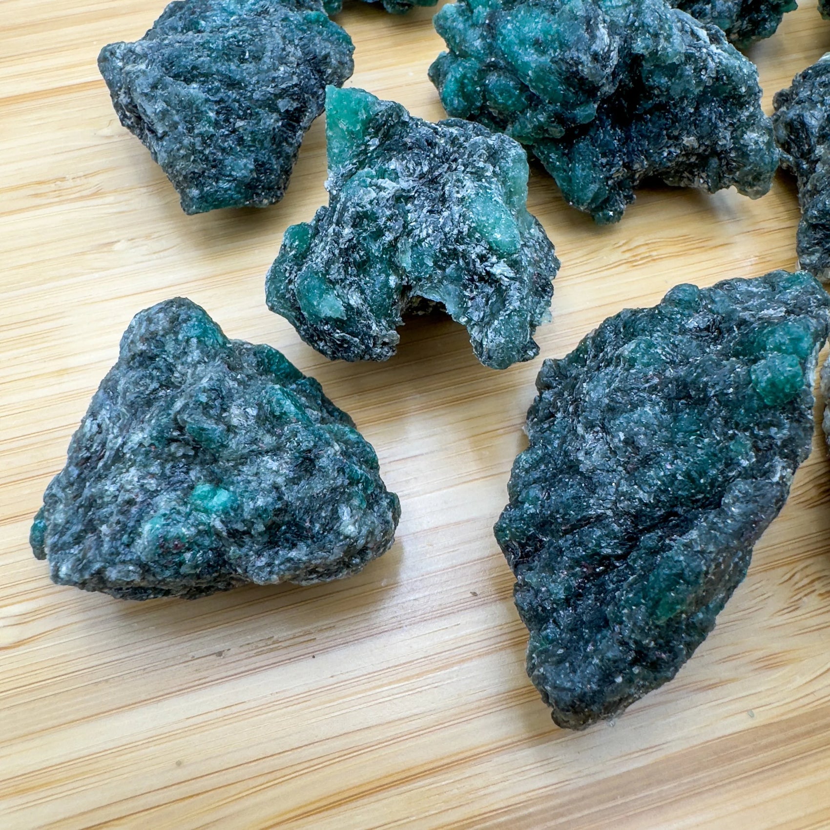 Detail capture of Grade AA Emerald raw stone, from Midlands Province, Zimbabwe, showing raw matrix.